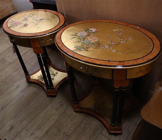 A pair of Chinese style oval painted lacquer two tier occasional tables W.70cm